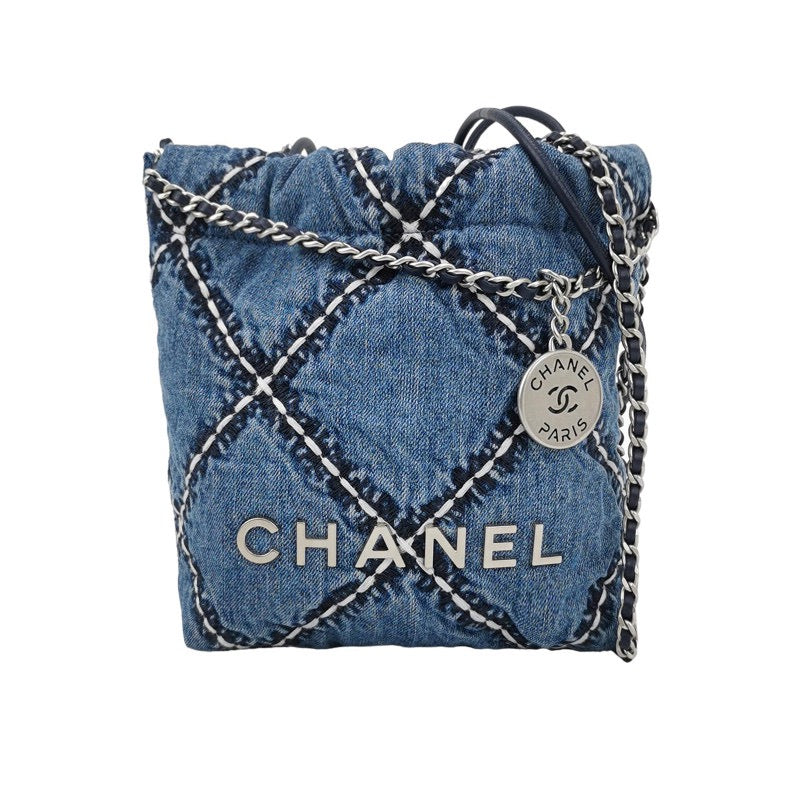 Chanel 22Bag mini cowhide denim plaid monogrammed logo silver coin charm crossbody bag